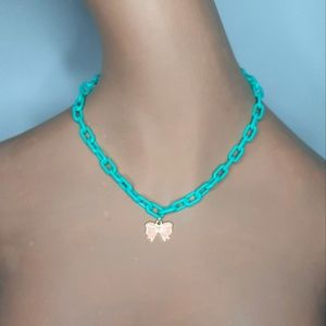 Plastic Aqua Link Necklace with Light Pink Bow Pendant.